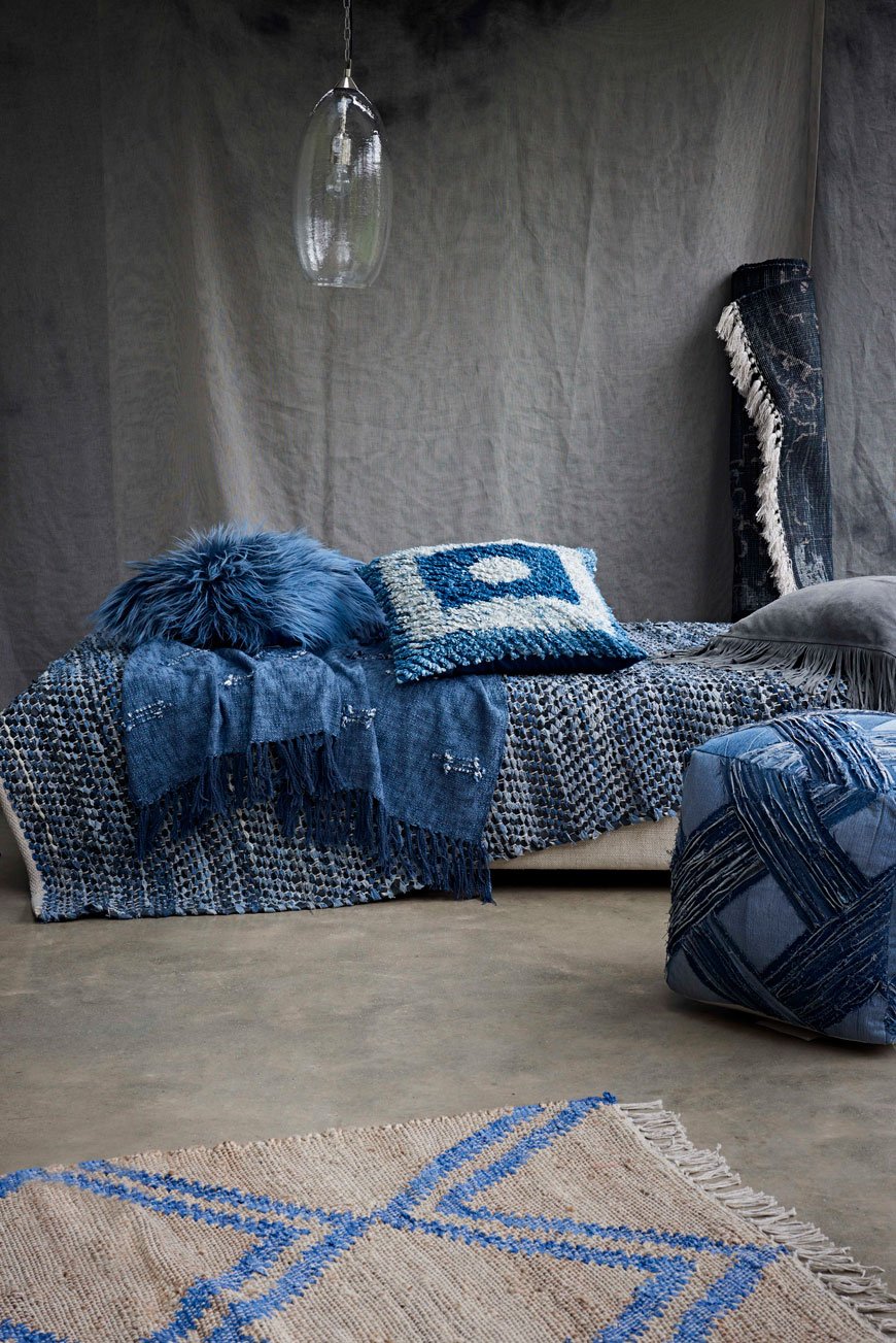 A styled collection of blue home accessories made from recycled materials from French Connection's Autumn-Winter 19 collection. 