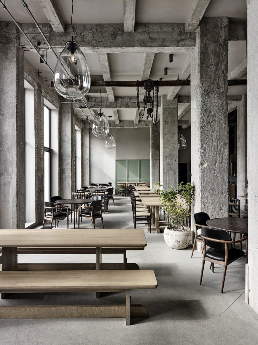 Inside the 108 Restaurant, Copenhagen with its industrial warehouse shell and minimal Nordic style. 