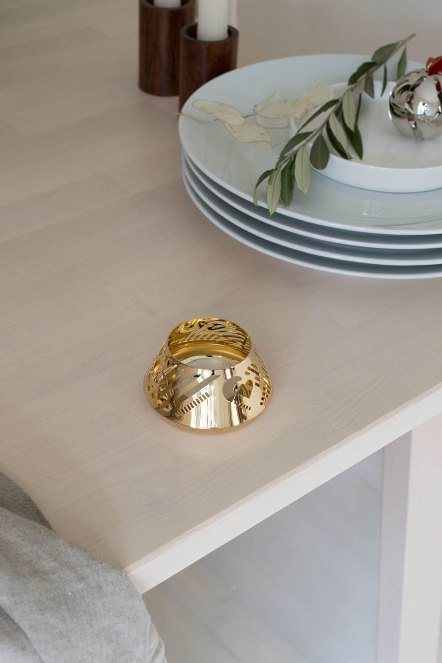 A touch of festive sparkle, a simple heart tea light holder designed by Georg Jensen. 