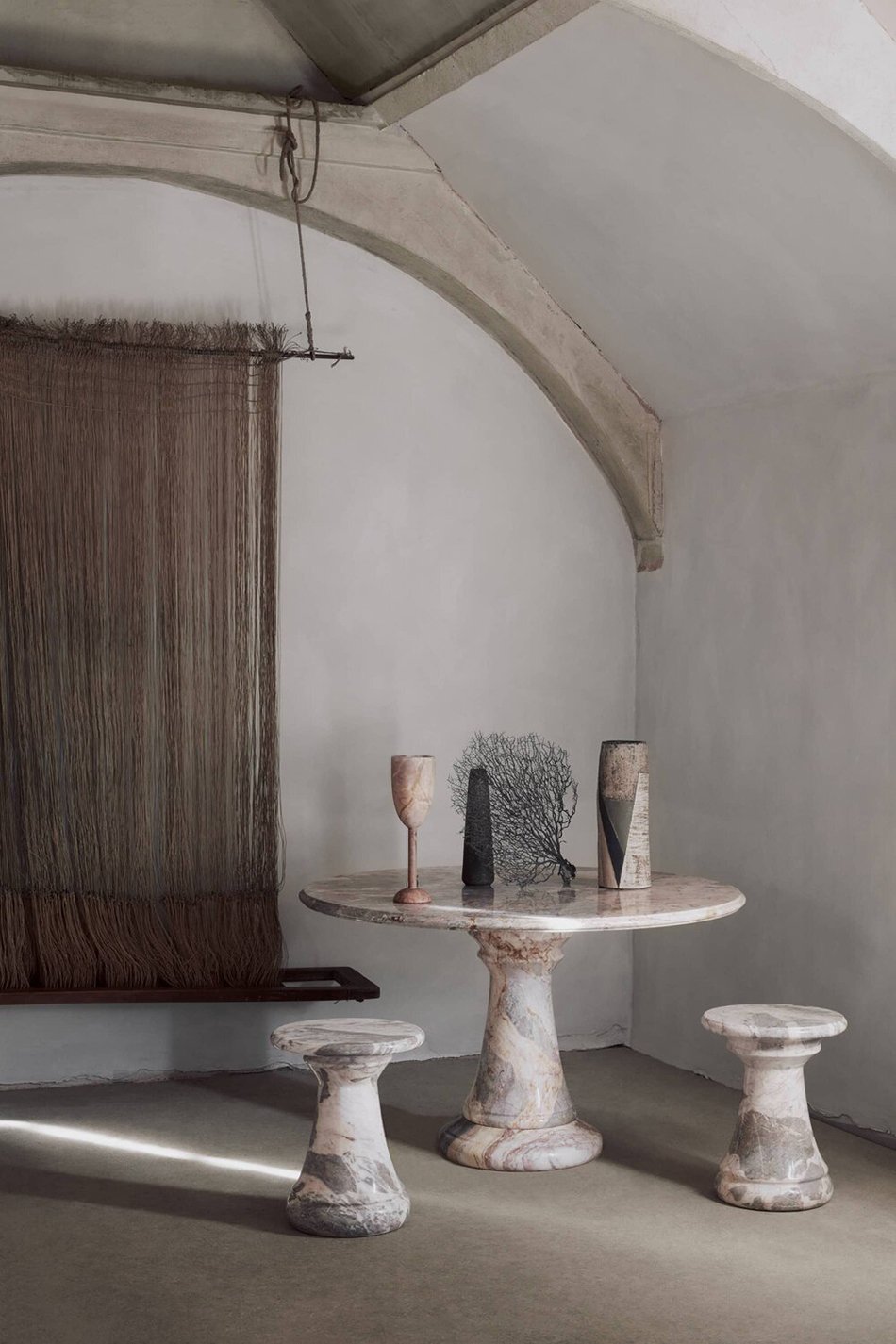 A minimal rustic room painted in  'Slow' off-white limewash paint designed by House of Grey for Bauwerk Colour.