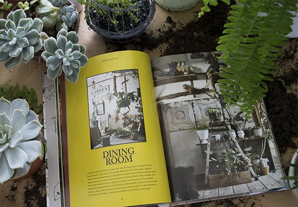 Decorating With Plants' (The Art Of Using Plants To Transform Your Home) by Satoshi Kawamoto in a bed of plants and succulents