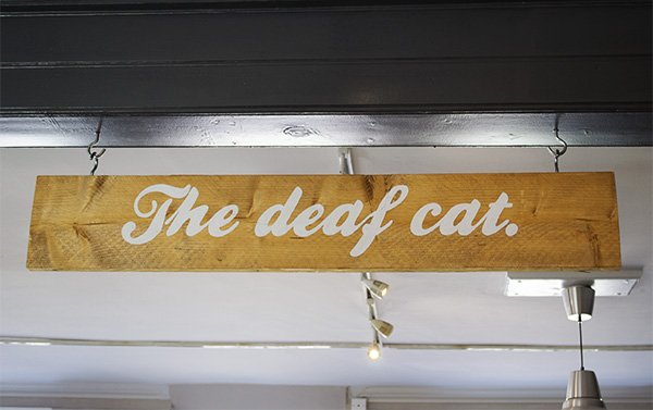 The Deaf Cat Coffee sign in Rochester