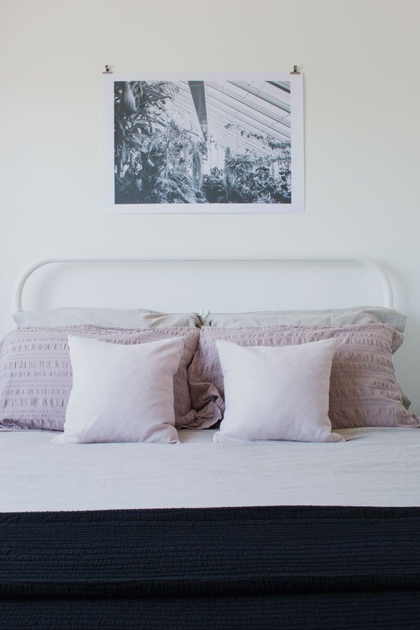 Adding art is one of my 6 styling tips for a minimal bedroom