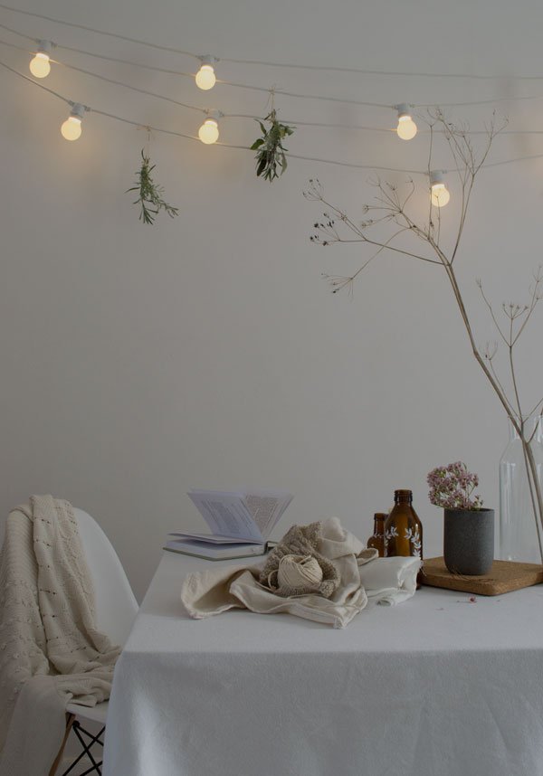 Out_There_Interiors_DIY_Wooden_Bead_Chandelier_String_Lighting_Winter04