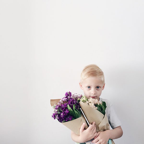 Boy with flowers - Curate & Display Instagram