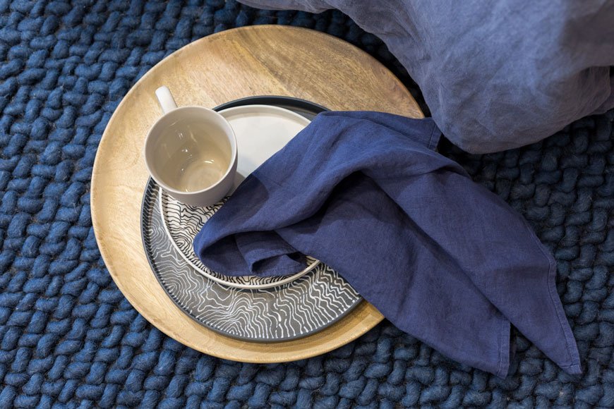 Heal's Scandi inspired Morten furniture collection, designed by John Jenkins, blue bedroom styling, visual merchandising, window styling, window dressing, Myer Halliday ceramics, chunky weave rug