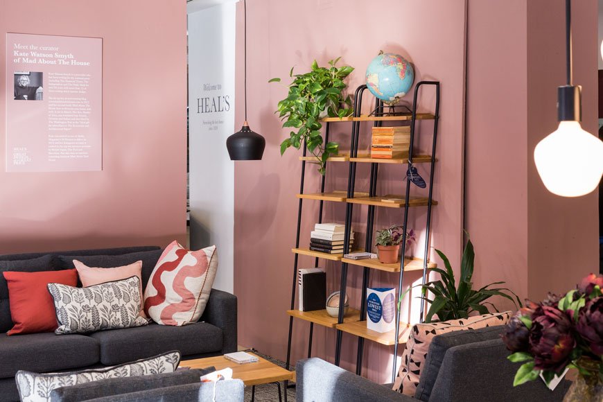 Heal's industrial mid-century Brunel furniture collection, designed by Rob Scarlett, pink and terracotta living room styling, visual merchandising, window styling, window dressing, Kate Watson_Smyth
