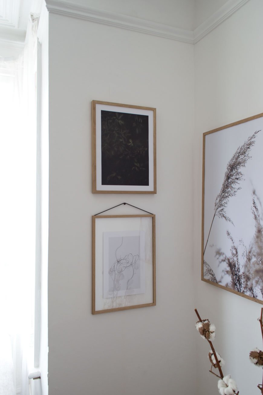 Living room gallery wall consisting of minimal art prints from Scandinavian art company, Desenio.