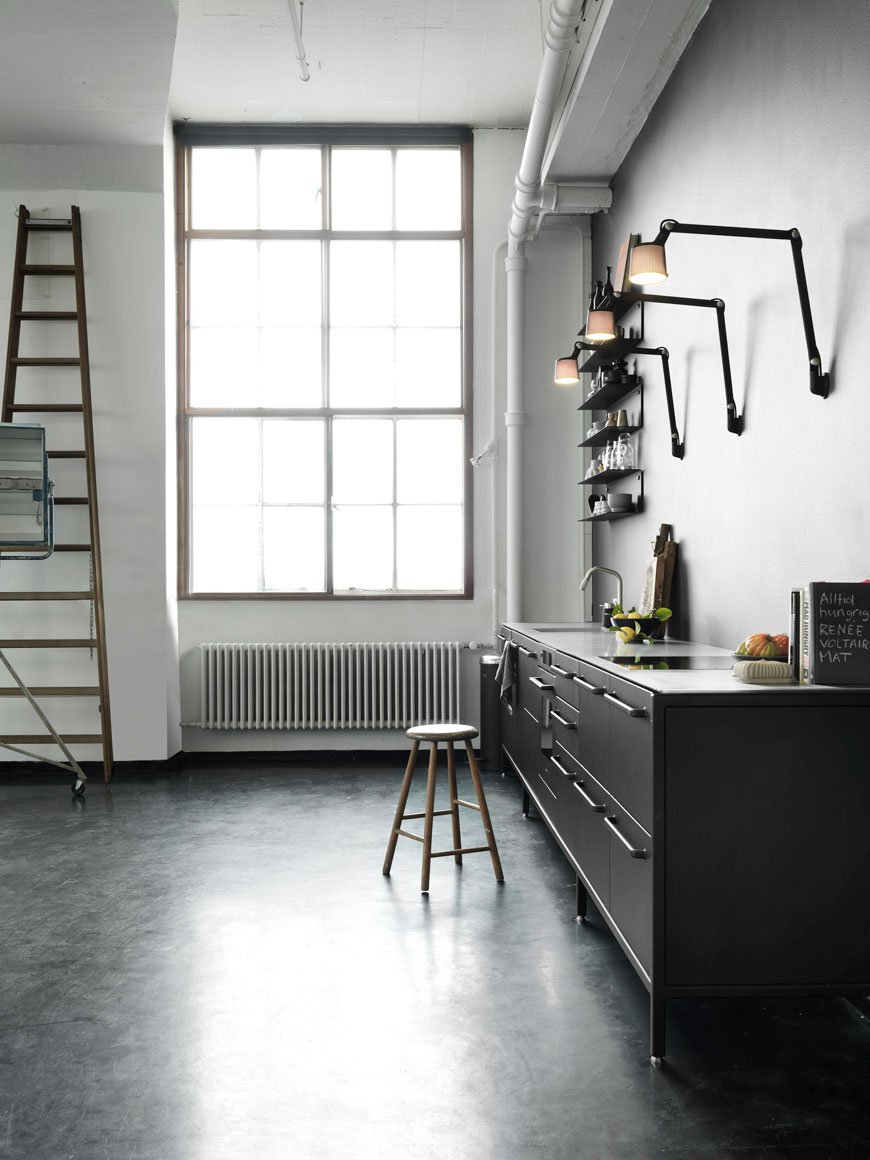 Vipp black wall light in a Nordic inspired monochrome kitchen 