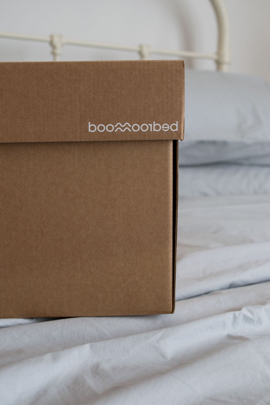 Bedroommood cotton sheets bedding box sitting on the bed