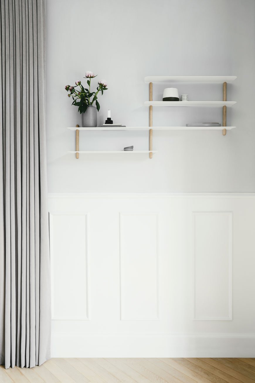 Minimalist white and oak shelves in a grey living room by Nordic design brand Gejst