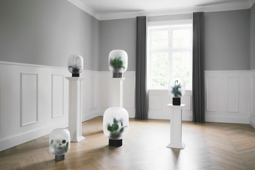 Frosted glass Nebl planters on pedestals designed by Nordic design brand Gejst.