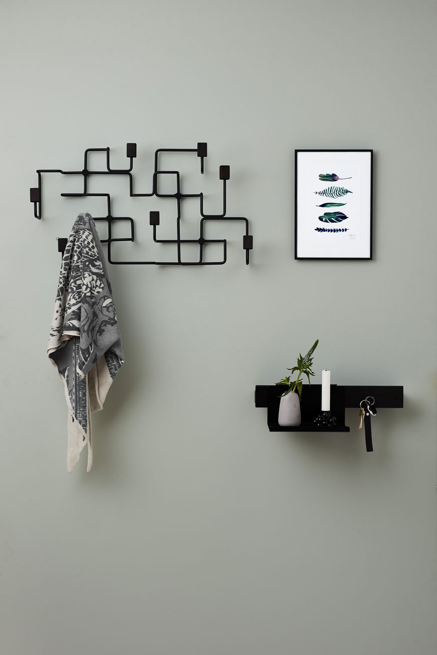 London underground inspired coat rack in the hallway, by Nordic design brand Gejst