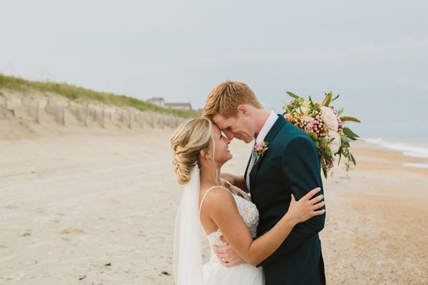 bride and groom at the sanderling resort 
