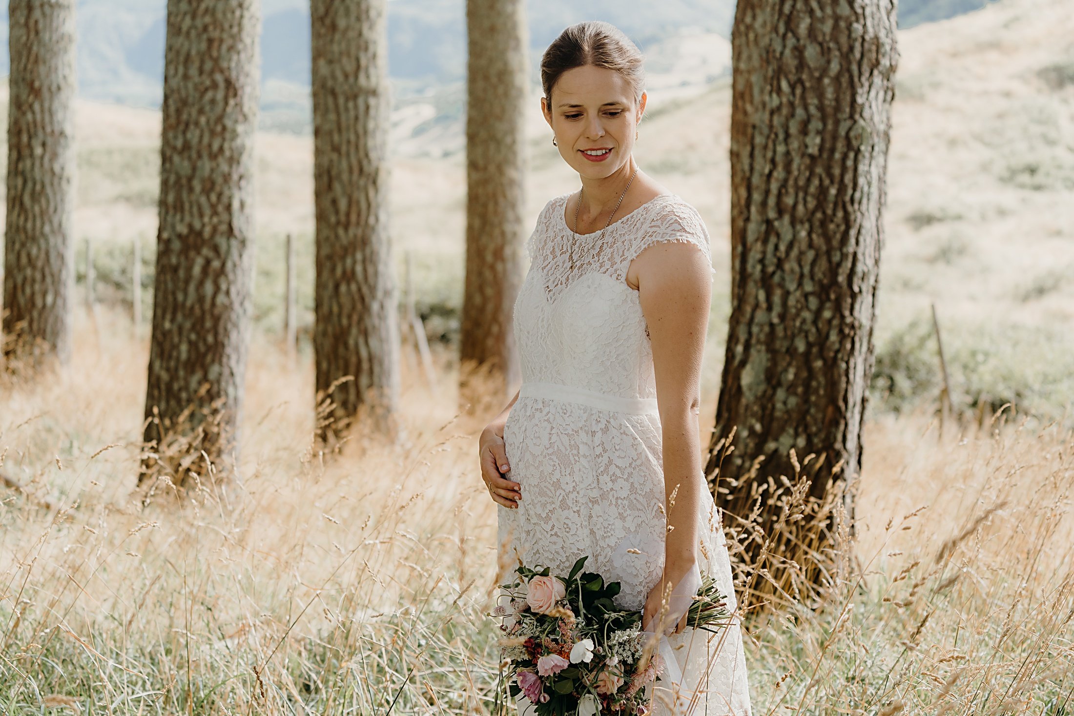 Daisy by Katie Yeung Wedding Dress and pregnant bride