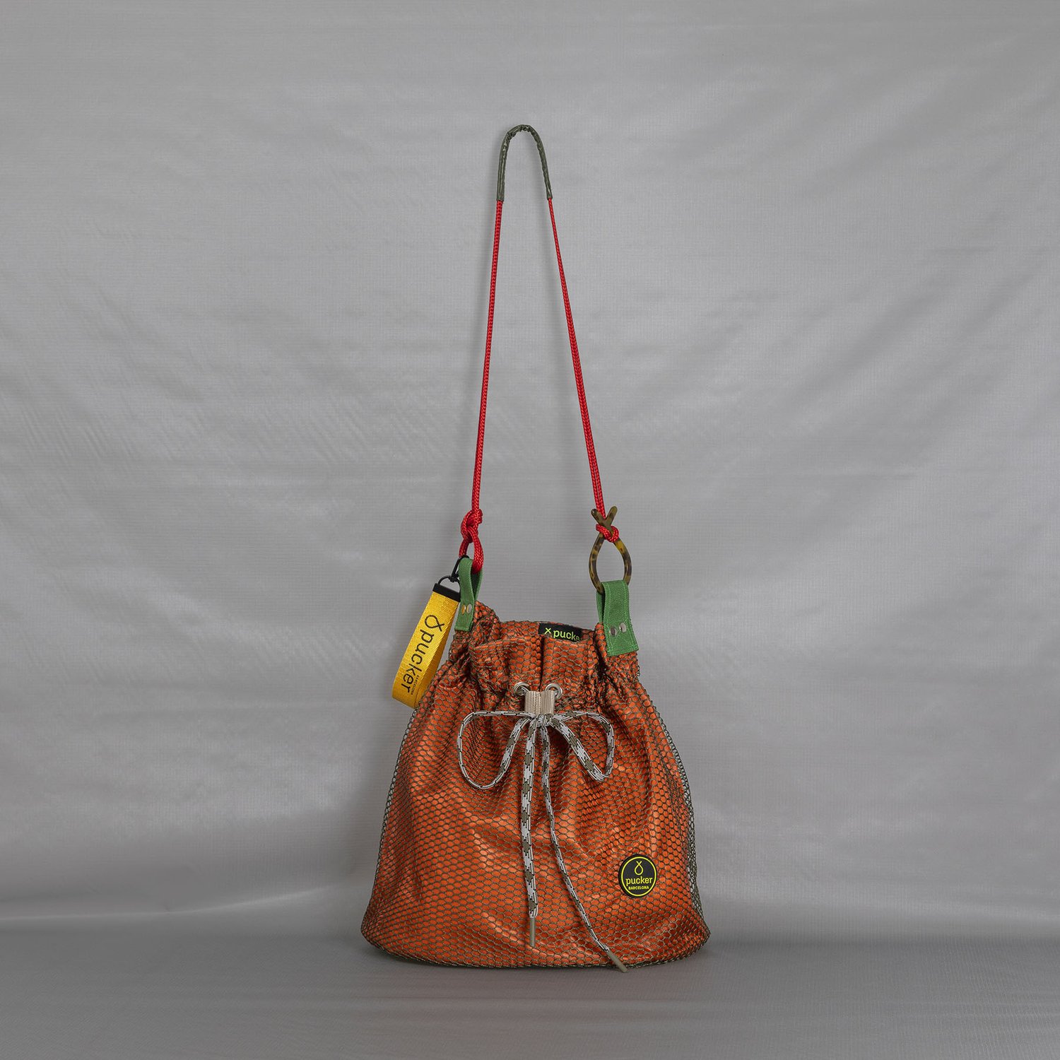 Lucía Orange — Pucker Barcelona | Upcycled Bags | Bolsos de Diseño hechos en con y cuerdas de paracaídas