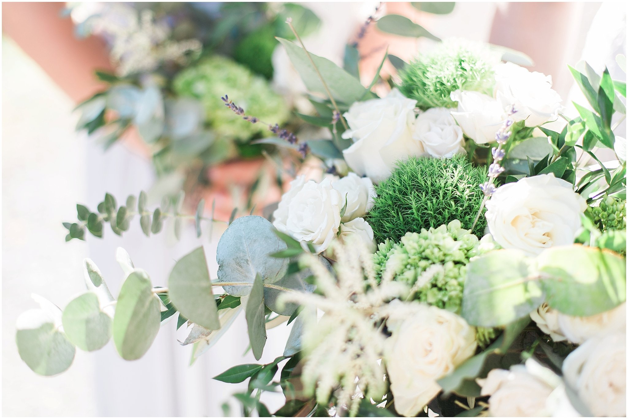  uneven eucalyptus, white rose and lavender bridal bouquet