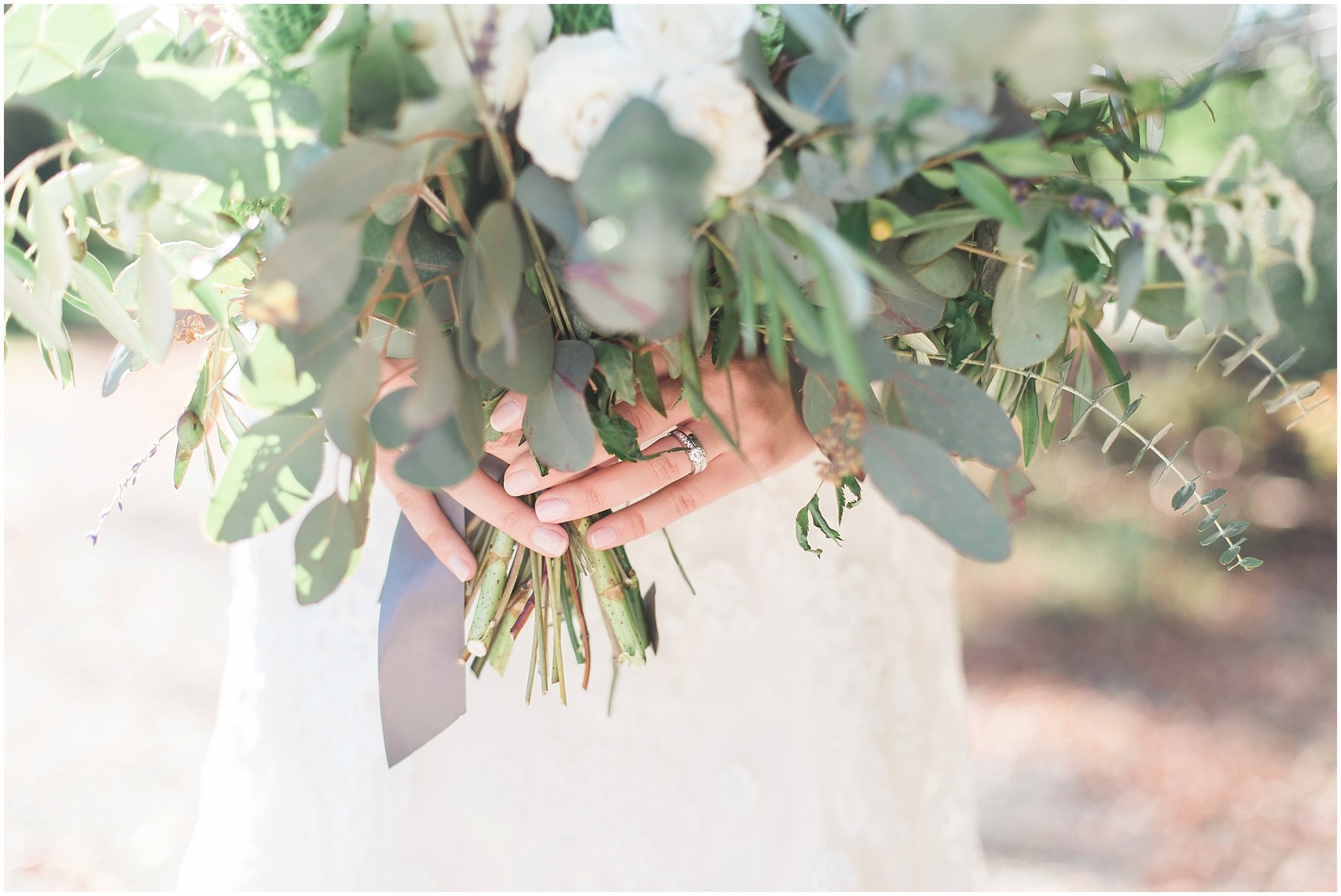 uneven eucalyptus, white rose and lavender bridal bouquet