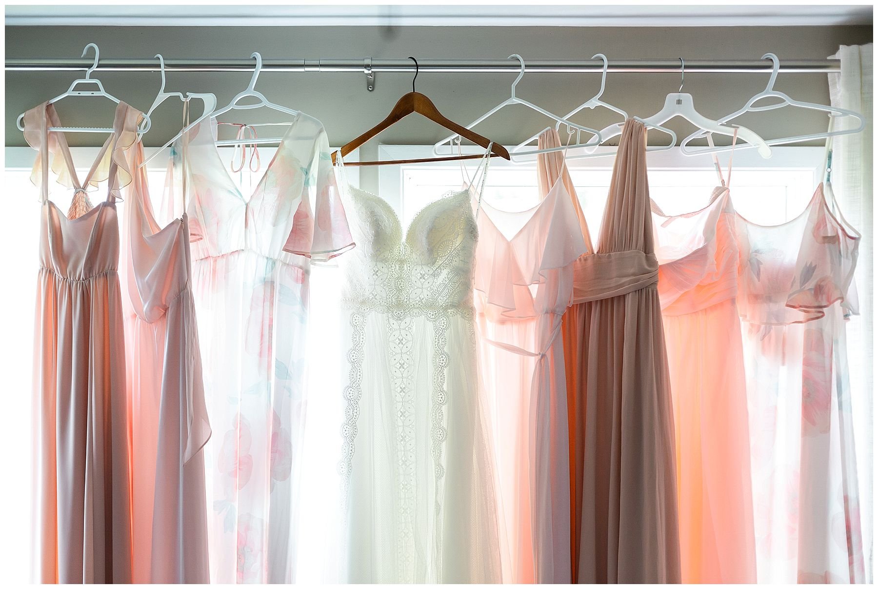 Blush, cream and floral mismatched bridesmaids dresses
