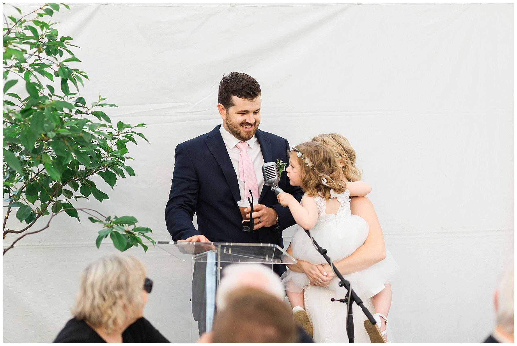 Bride and groom speech in tent wedding
