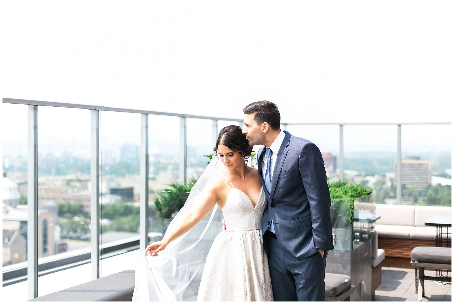 bride and groom first look at The Andaz rooftop Copper Spirits and Sights lounge 