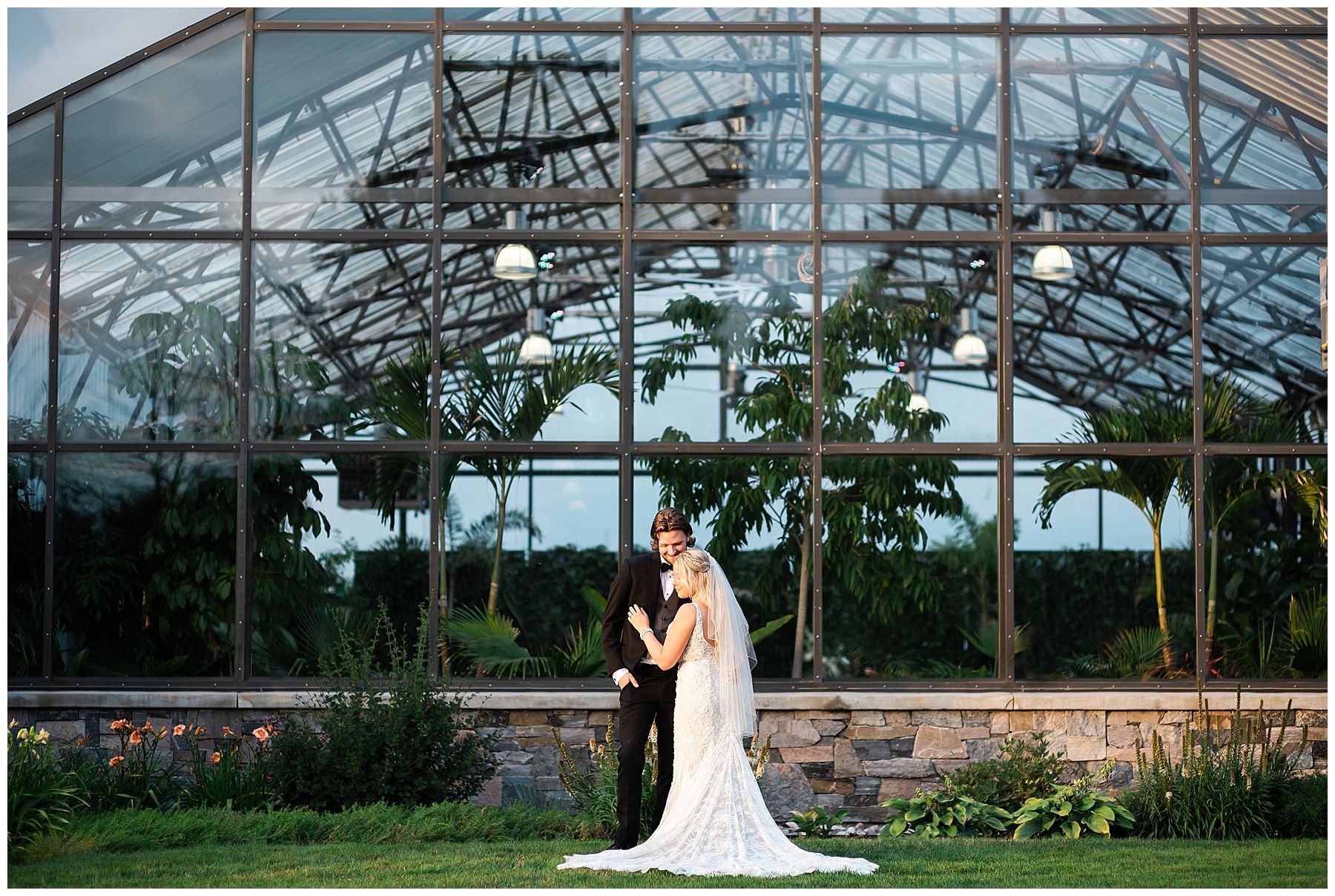 bride and groom portraits at Aquatopia conservatory wedding