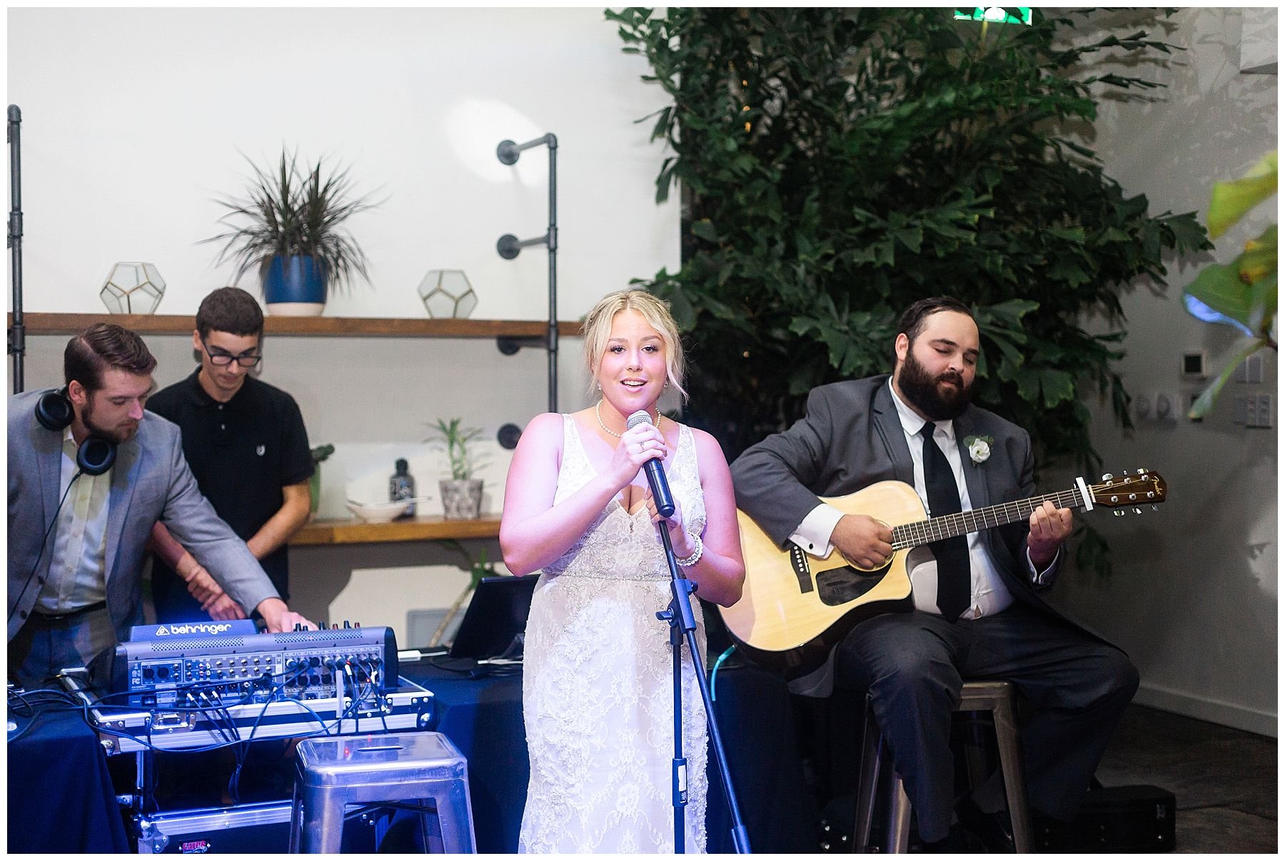 Bride sings to groom at Aquatopia reception venue