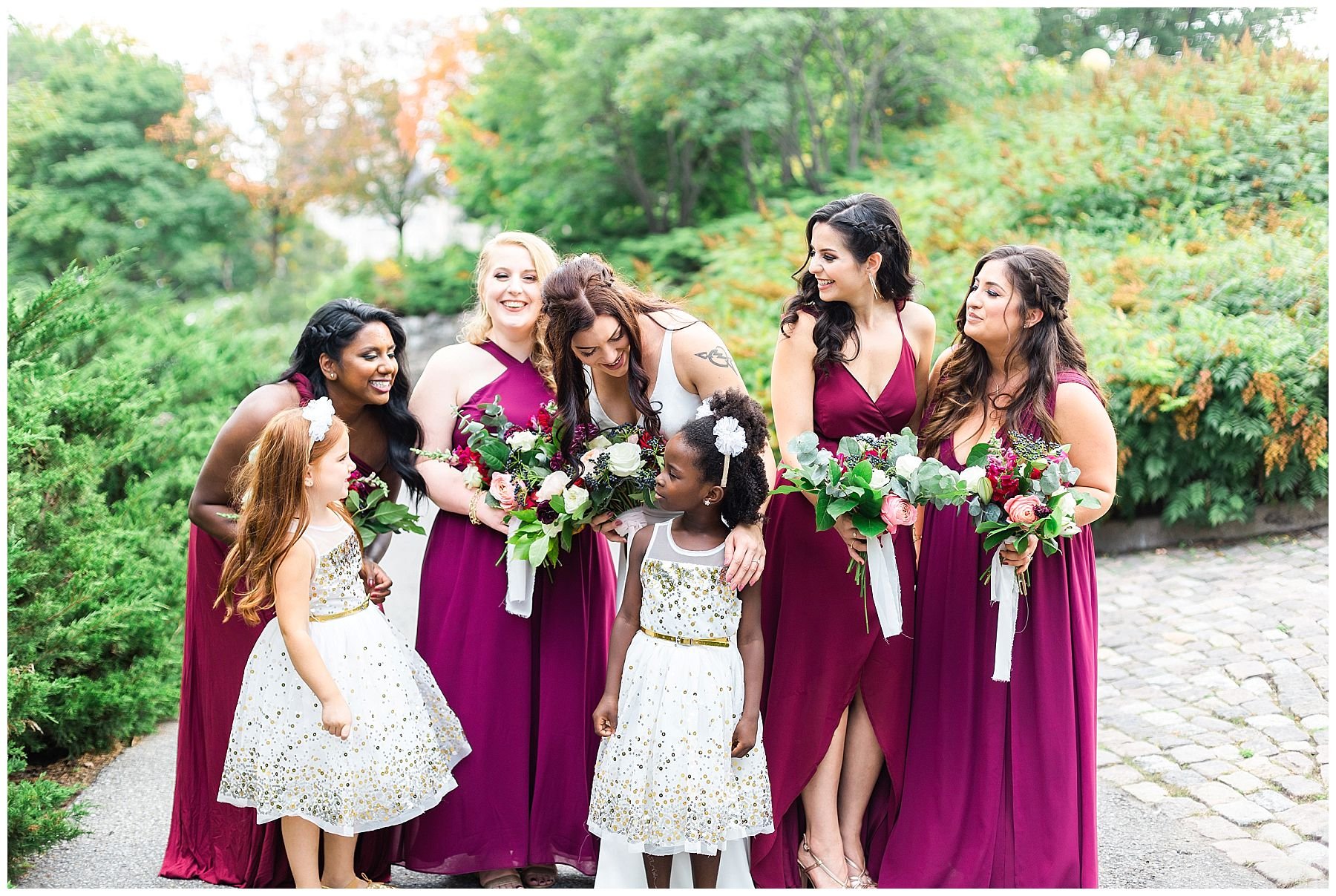 bridesmaids with flower girls