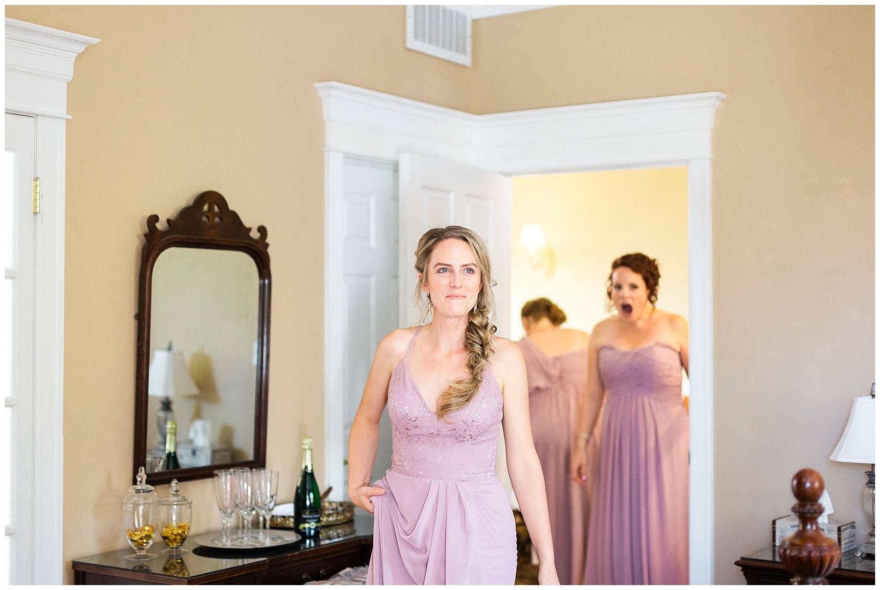 Lavender bridesmaids first look at bride
