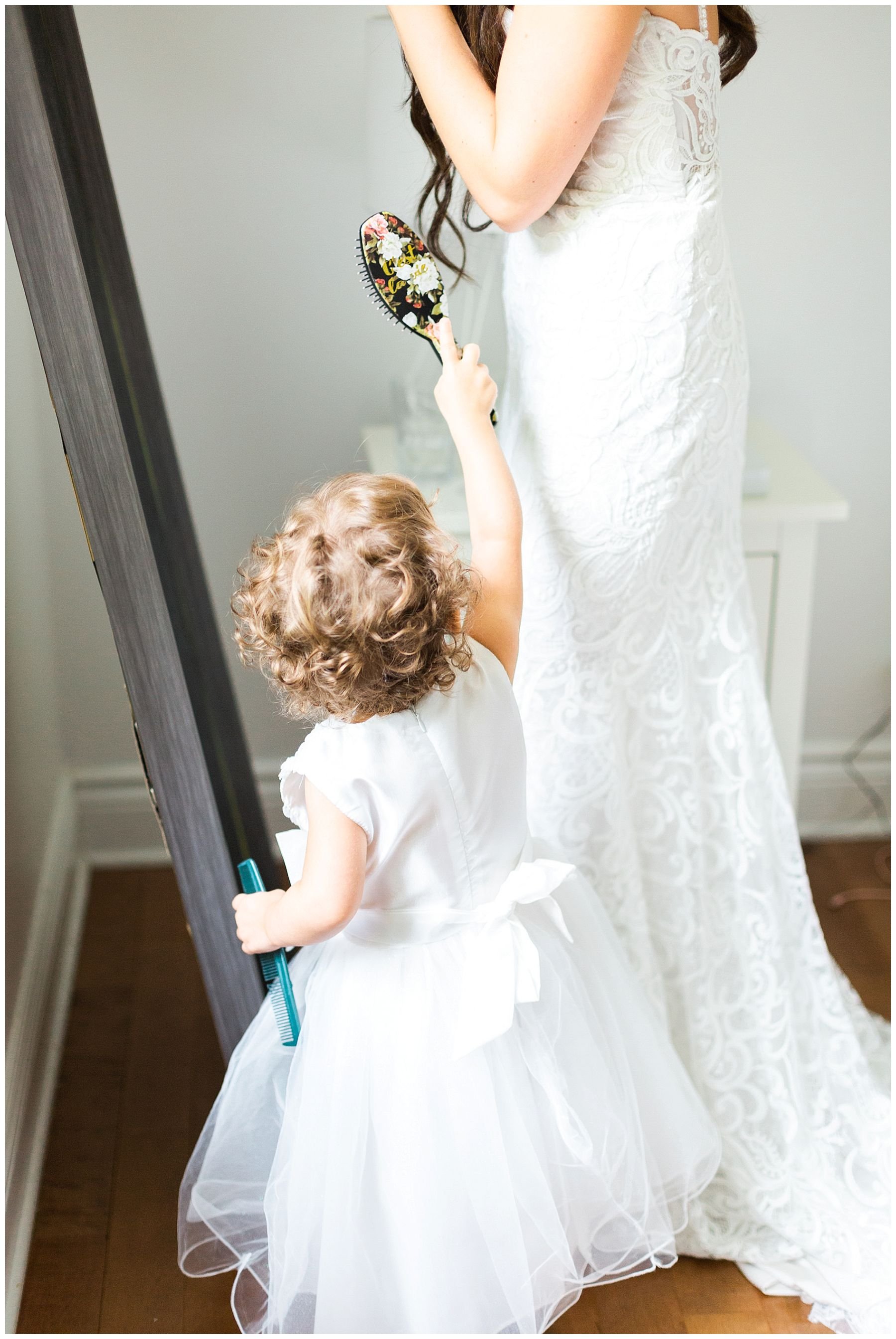 cute flower girl moment with the bride