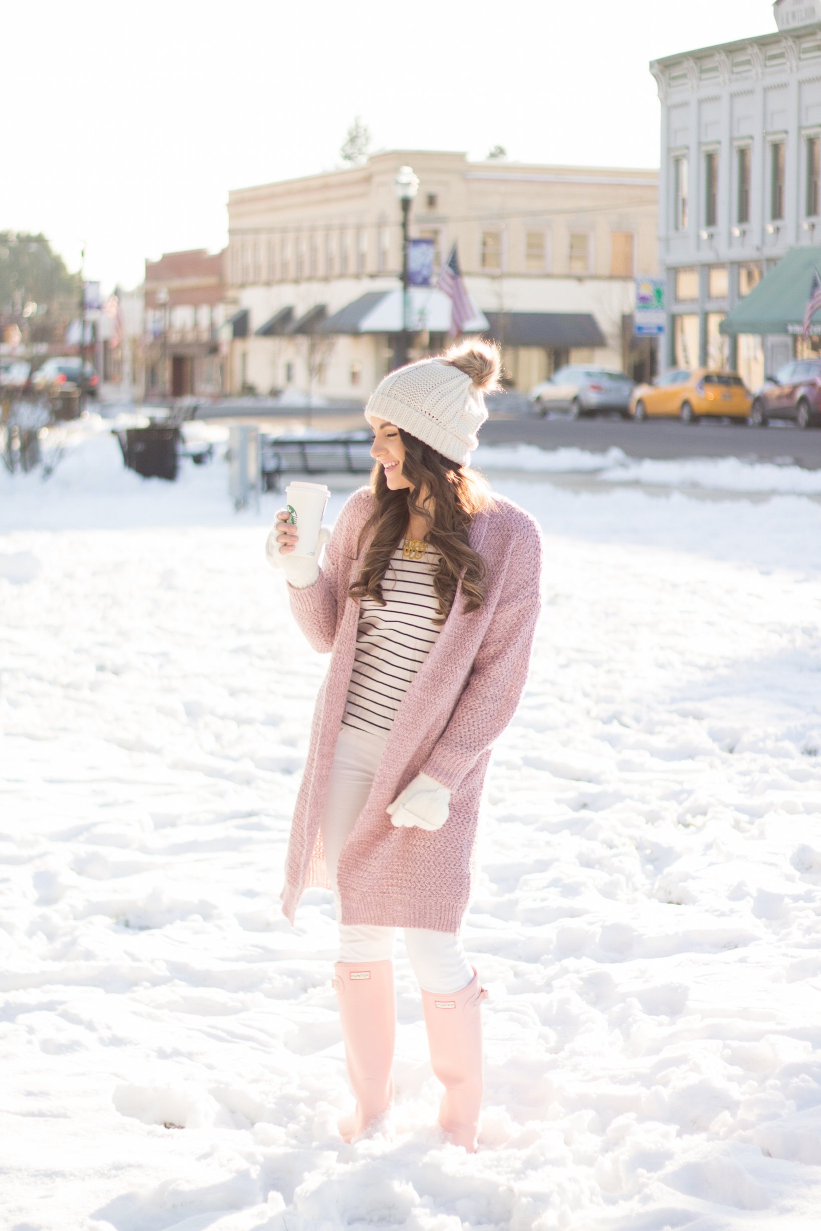 A fun pink knit sweater and pink hunter boots are the perfect equation for a snow bunny look.  - Are Pink Hunter Boots Worth the Money? by Portland fashion blogger Top Knots and Pearls