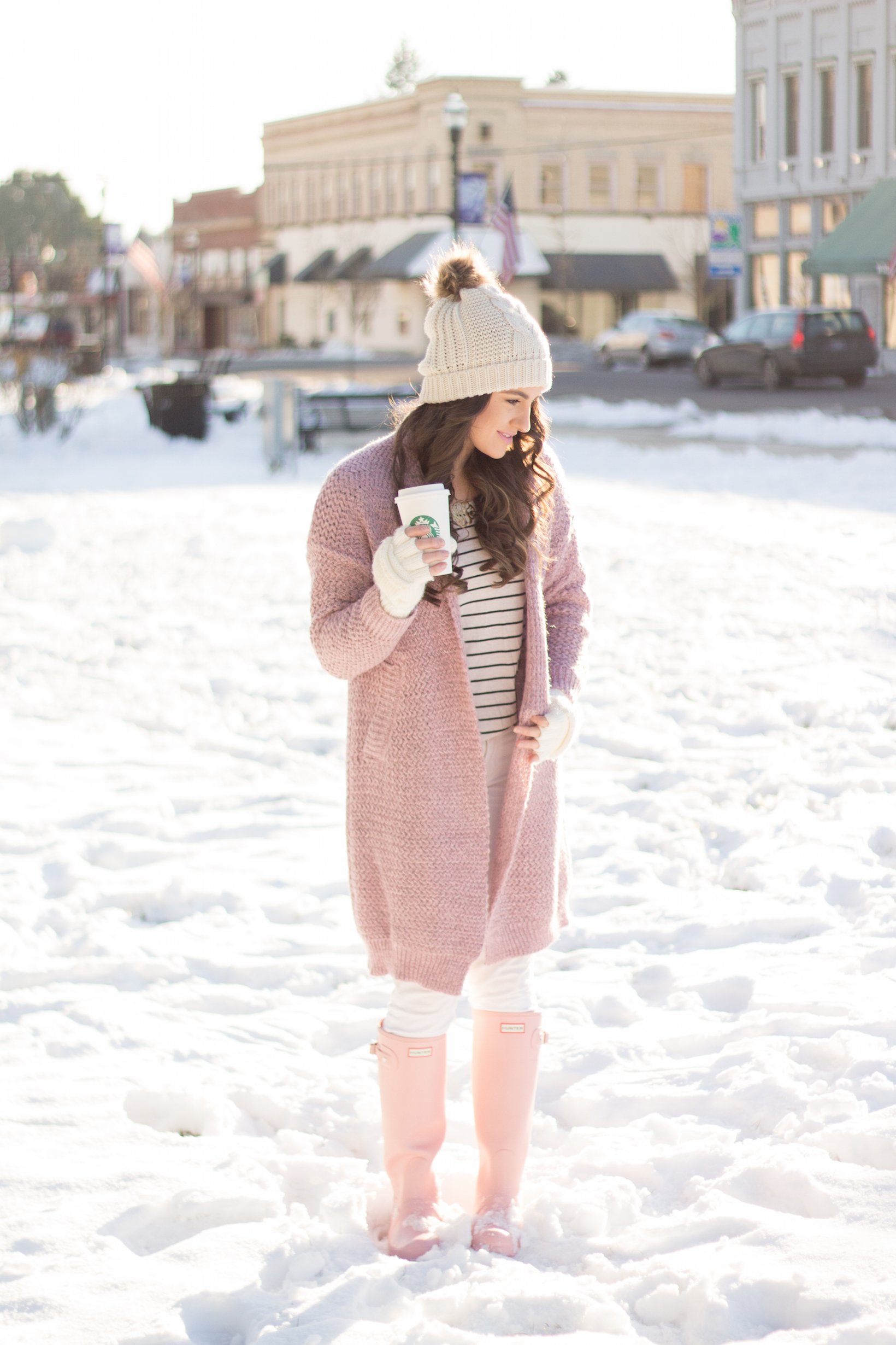 A fun pink knit sweater and pink hunter boots are the perfect equation for a snow bunny look.  - Are Pink Hunter Boots Worth the Money? by Portland fashion blogger Top Knots and Pearls