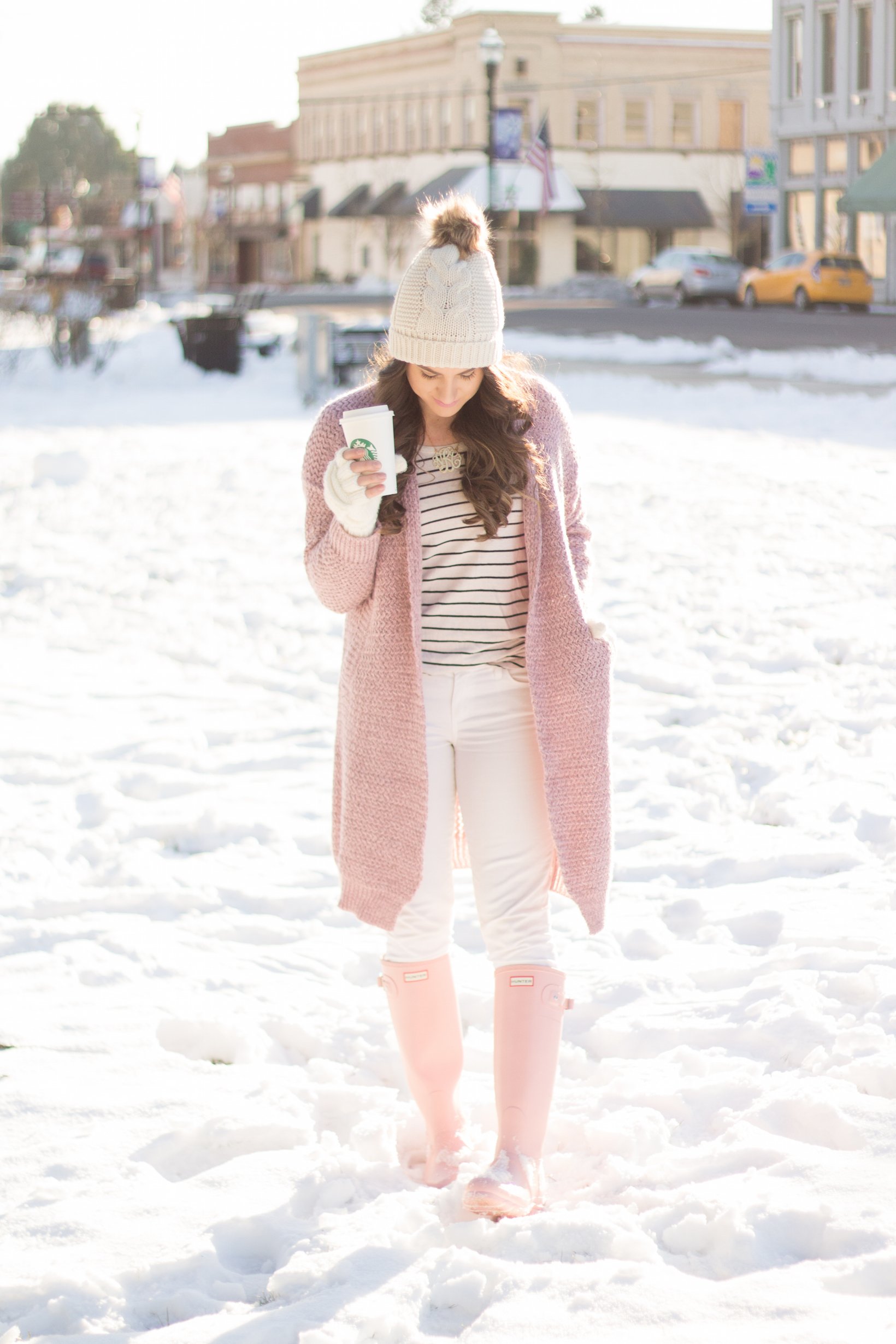 A fun pink knit sweater and pink hunter boots are the perfect equation for a snow bunny look. - Are Pink Hunter Boots Worth the Money? by Portland fashion blogger Top Knots and Pearls