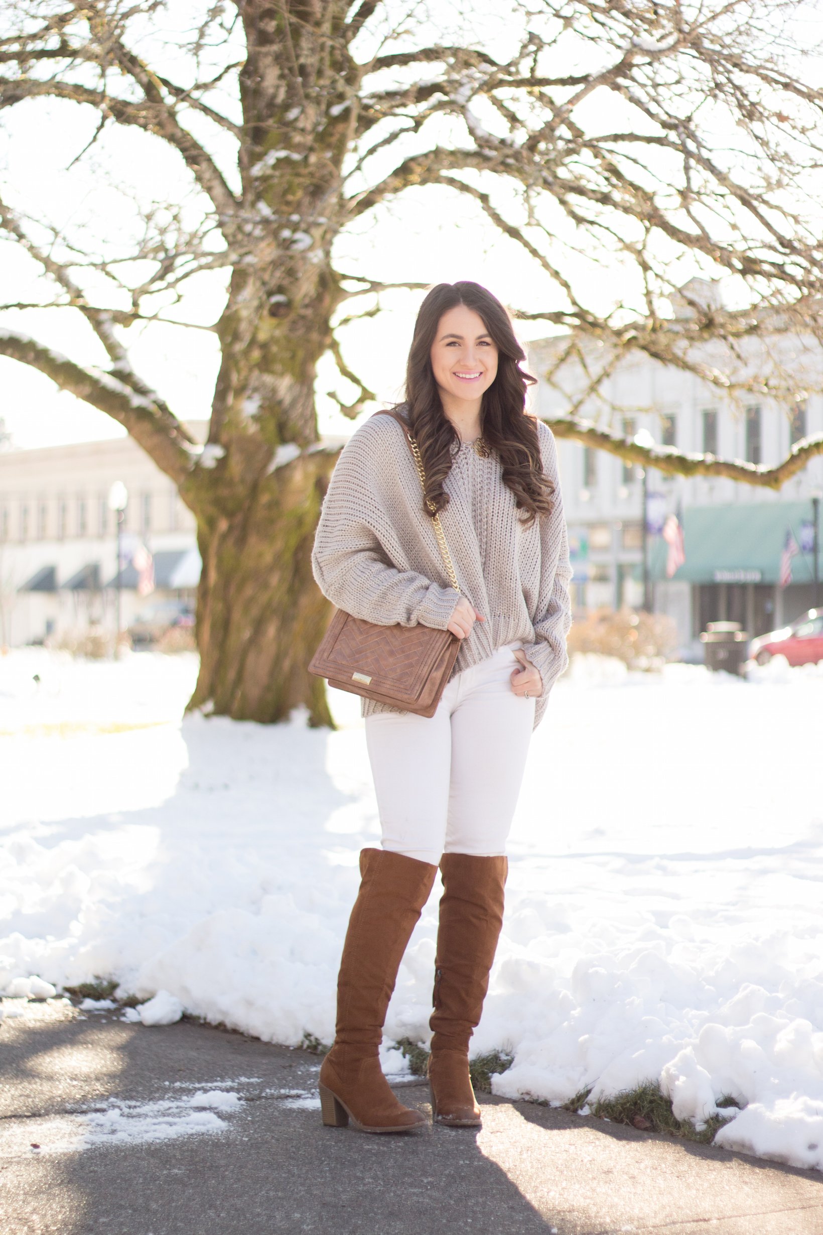 The perfect Winter look in this oversized grey sweater and over the knee boots. 