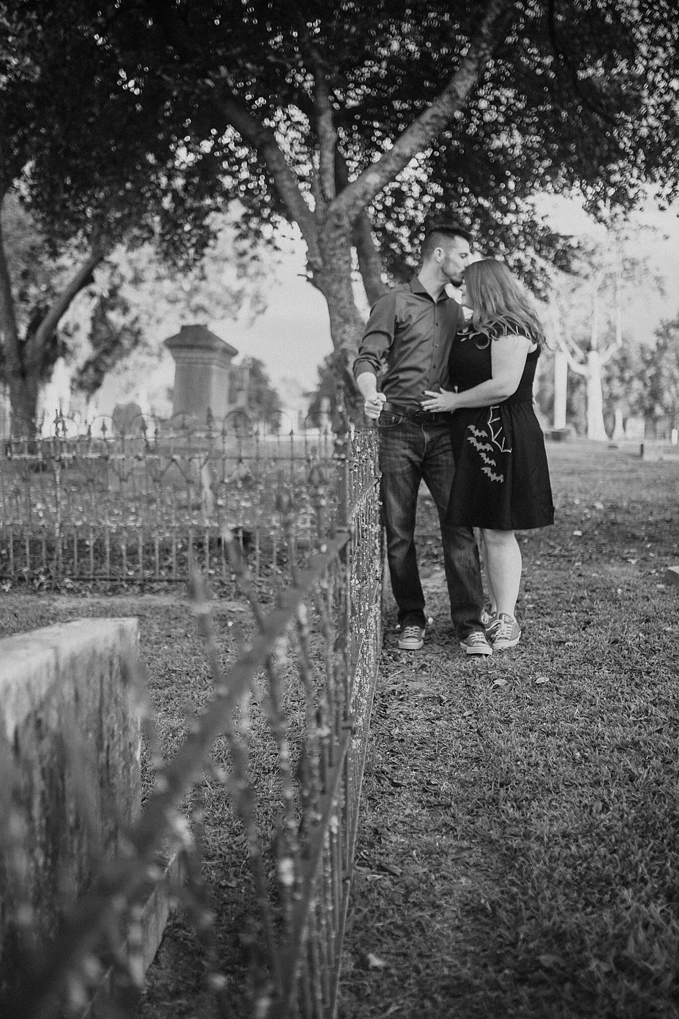 black and white portrait from graveyard engagement session