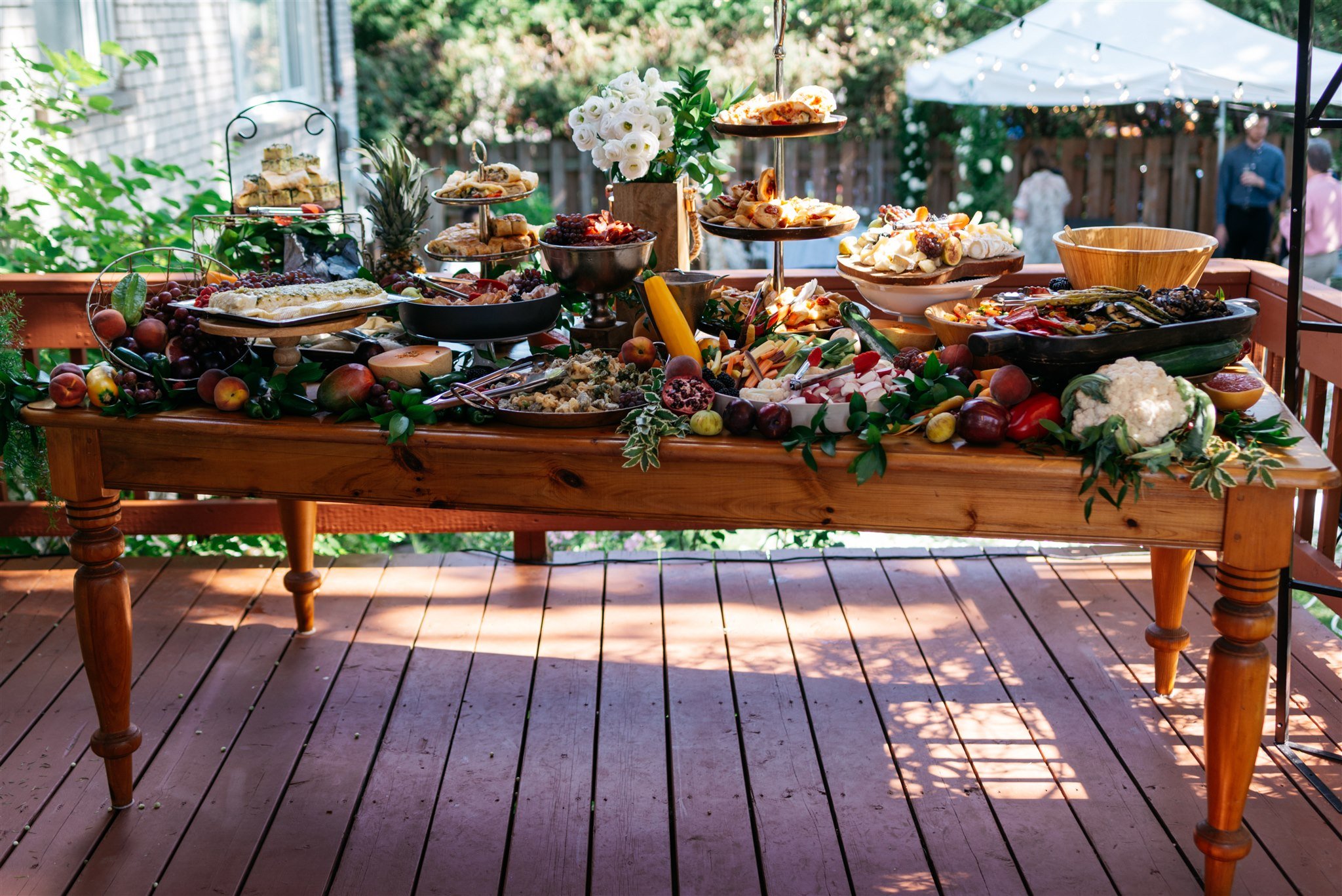 Food table at backyard wedding in Montreal. 