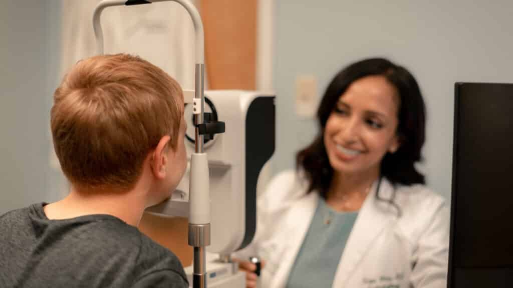 Hawaii pediatric patient being examined by eye doctor Dr. Rupa Wong of Honolulu Eye Clinic for myopia management