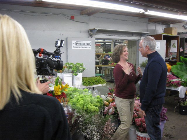 Barbara Schnur and J Schwanke talk flowers
