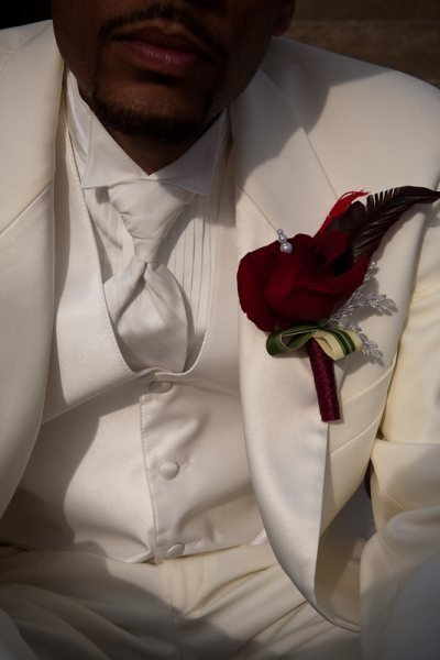Red boutonniere by Tanti Lina