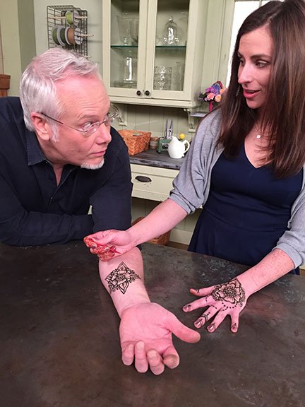 Amanda Gilbert from Happy Henna- applies a Flower Tattoo on Life in Bloom!