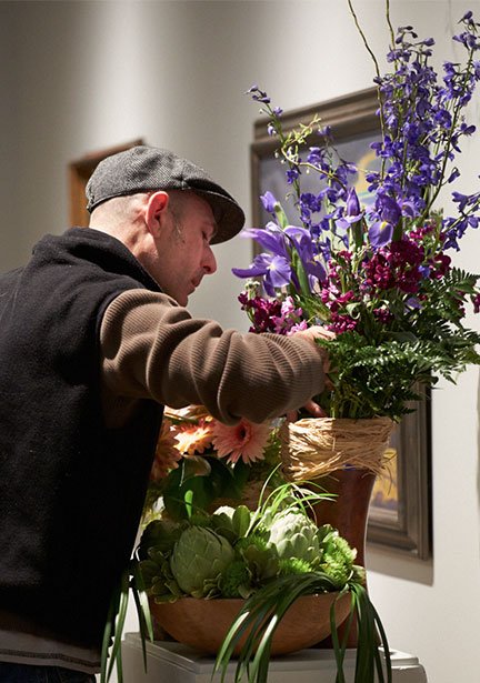 Fellow Michigan Flower Artist James Luetke making adjustments to his ART in Bloom installation.