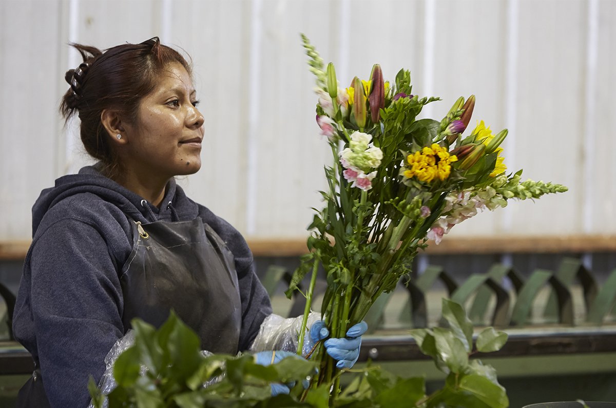 Holland America- making bouquets safely - with physical distancing... Flower Power!