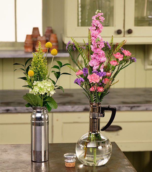 Vintage Coffee Vessels are fun to use as flower vessels- it's a great way to get your memories off the shelf!