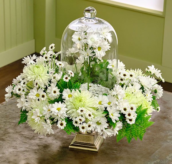 This arrangement created out of Chrysanthemums of all kinds - has a fairytale theme- Cloché Included!