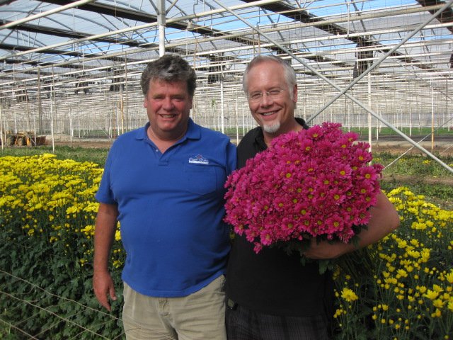 My Flower Friend- René VanWingerden- with armloads of 'mums' at Ocean Breeze in Santa Barbara CA