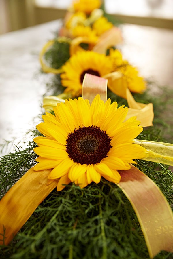Bring on the Sunshine - at your next party or event- with a sunflower garland- Let me show you how it's done!