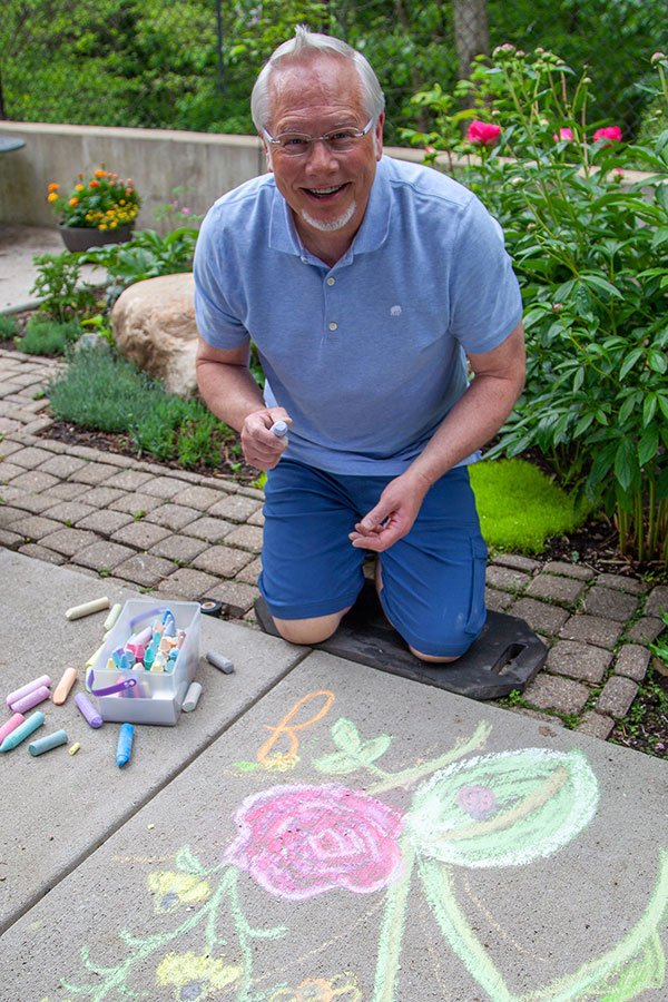 Take some time- to have a little childhood fun- and draw flowers with chalk on the sidewalk!