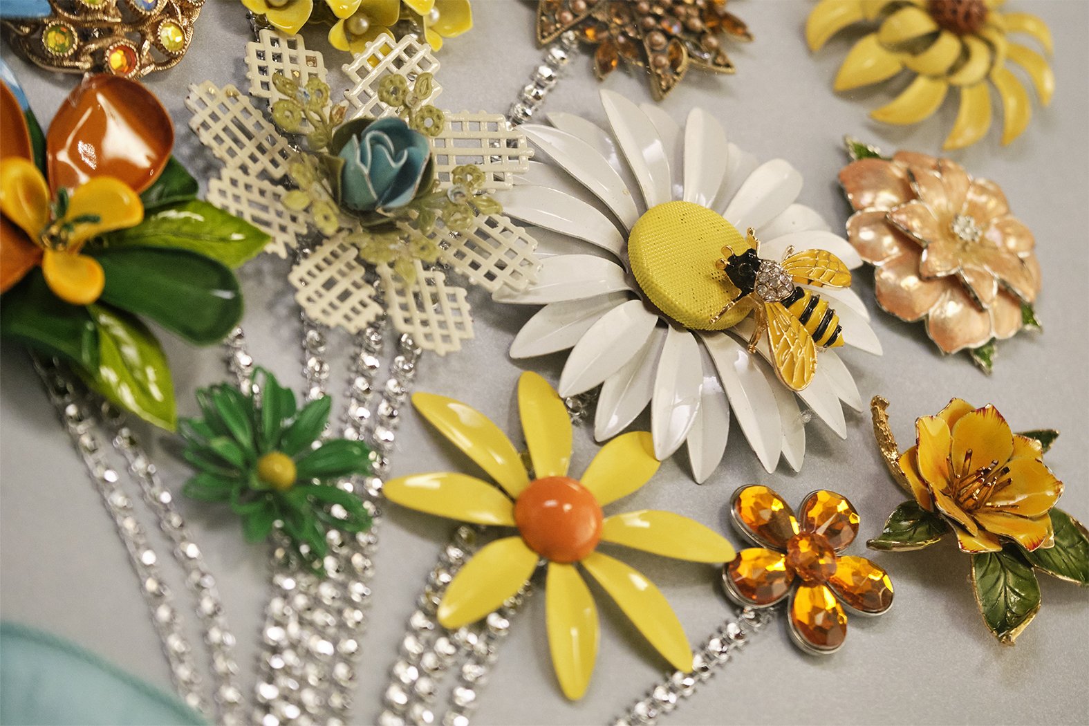  “J Schwanke’s Life in Bloom” is filled with projects, recipes and crafts - all inspired by flowers- including this wall art- created from Vintage Flower Brooches- featured in Season 4- coming in April 2022.