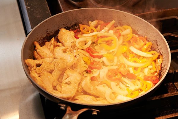 Cook the Marinaded Chicken Breasts- and Peppers and onions on the stove- or on a grill!