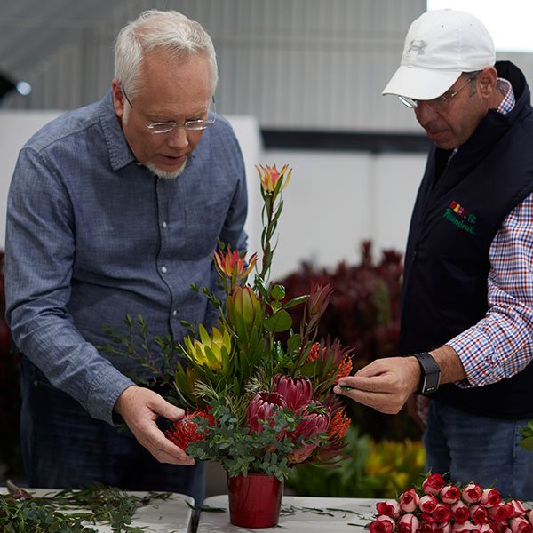 Arranging Tropical Flowers- in Colombia South America- at Rosamina Farms- with my Flower Friend Eli Perez